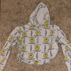 A cropped hoodie that shares kind messages to anyone reading. Size large.